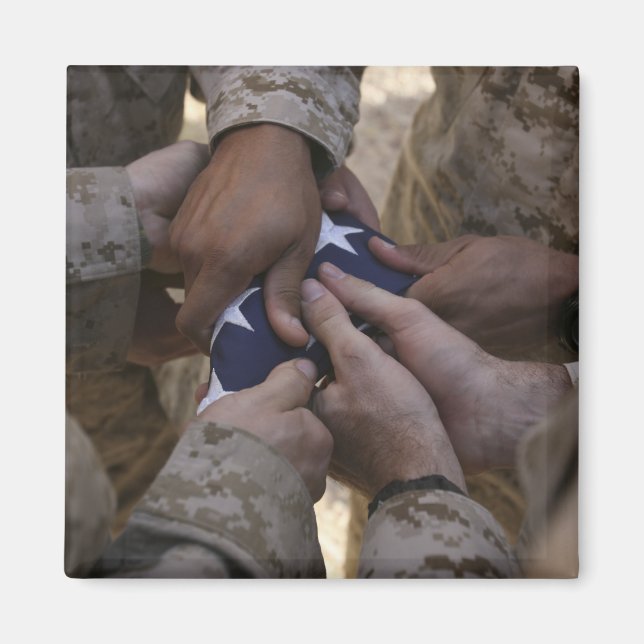 Marines fold an American flag Magnet (Front)