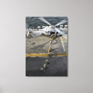Marines prepare to board an MH-60S Canvas Print
