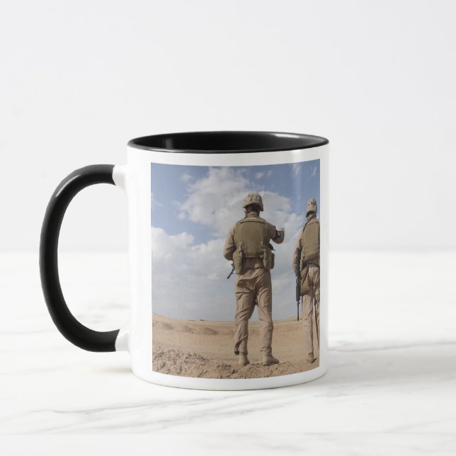 Marines scan the horizon for insurgent activity mug (Left)