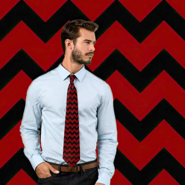Maroon and Black Zig Zag Striped Tie (Man models a maroon and black chevron pattern tie. Background matches tie.)