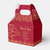 Maroon and gold Ganesha Indian wedding custom