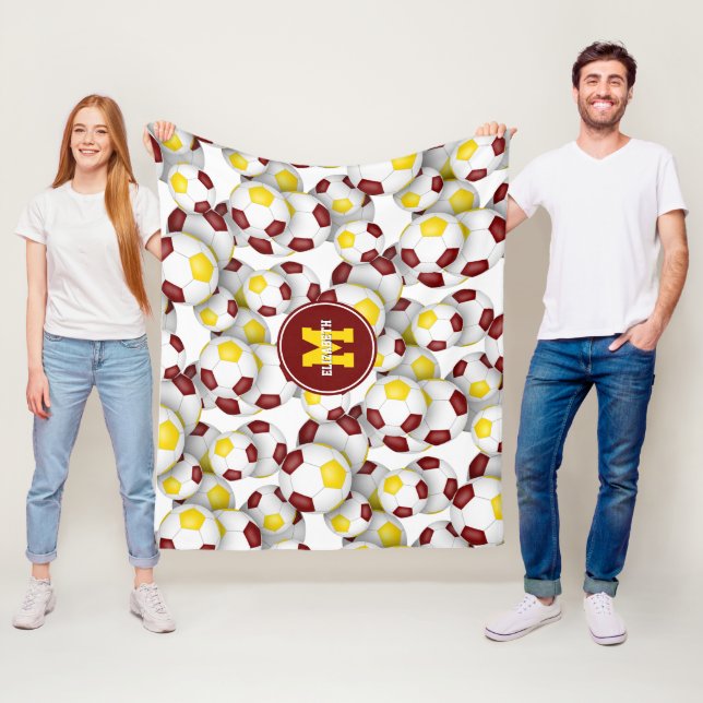 maroon gold team colours soccer balls pattern fleece blanket (In Situ)