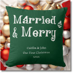 Married and Merry First Christmas Newlywed Green Cushion<br><div class="desc">Tis the season to spread joy and love to your newlywed friends or family members! Our "Married and Merry Our First Christmas" throw pillow in forest green is a fun and festive gift option. With its clean and modern font and classic holiday colours, this pillow will complement any seasonal décor....</div>