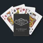 Married in Fabulous Las Vegas Silver Wedding Playing Cards<br><div class="desc">These unique and fun custom "Married in Fabulous Las Vegas" wedding favour playing cards feature a silver faux foil design inspired by the Welcome to Las Vegas,  Nevada" sign,  along with monogram text that can be personalised with the couple's name and wedding date. Black background colour can be modified.</div>