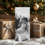 "Married & Merry Newlywed Christmas Photo<br><div class="desc">"Celebrate your first Christmas as a married couple with this elegant ‘Married & Merry’ holiday card. Featuring a full-photo layout with bold modern typography,  this minimalist design is perfect for showcasing your favourite wedding or engagement picture. A timeless way to send festive greetings and love this holiday season."</div>