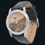 Mars Science Laboratory Curiosity Rover. Watch<br><div class="desc">Artist concept of Mars Science Laboratory Curiosity rover, a mobile robot for investigating Mars' past or present ability to sustain microbial life. In this picture, the rover examines a rock on Mars with a set of tools at the end of the rover's arm, which extends about 7 feet. Two instruments...</div>