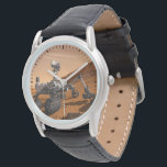 Mars Science Laboratory Curiosity Rover. Watch<br><div class="desc">Artist concept of Mars Science Laboratory Curiosity rover, a mobile robot for investigating Mars' past or present ability to sustain microbial life. In this picture, the rover examines a rock on Mars with a set of tools at the end of the rover's arm, which extends about 7 feet. Two instruments...</div>