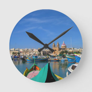 Marsaxlokk harbour, fisherman village round clock