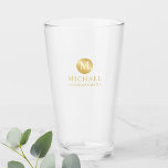 Masculine Gold Personalised Groomsmen Glass<br><div class="desc">Add a personal touch to your wedding with personalised groomsmen glass. This glass features monogram in gold circle element with name and title in gold professional font style. Also perfect for best man, father of the bride, ring bearer and more. Please Note : The foil details are simulated in the...</div>