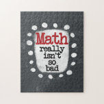 Math Really Isn't So Bad Jigsaw Puzzle<br><div class="desc">A fun mathematics themed typographic piece with the words "Math Really Isn't So Bad". It's grey and white with black and red text and white whimsical dots surrounding the phrase.</div>