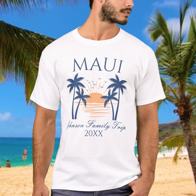 Maui Family Vacation Trip T-Shirt (Man wearing a Maui family trip t-shirt with a sunset and palm tree design, standing on a beach.)