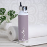 Mauve Personalised Wedding Bridesmaid Colour Water Bottle<br><div class="desc">Gift your wedding bridesmaid or maid of honour with this trendy,  vacuum Insulated water bottle that features her name in white,  stylised script on a mauve colour background designed to match your wedding colour scheme. Personalise bottle by editing and replacing with desired name. Select your water bottle style.</div>