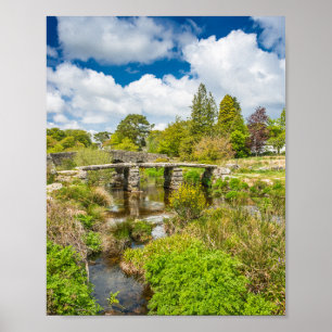 Mediaeval clapper bridge over river in Dartmoor UK Poster