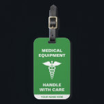 Medical Equipment Handle with care Luggage Tag<br><div class="desc">Personalized Medical handle with care Luggage Tag with medical caduceus in green and white. It is perfect for anyone transporting medical equipment, for a medic, a health professional or a diabetic. The perfect luggage identifier to display on your luggage and have everyone handle with care. This medical alert label will...</div>