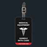 Medical Equipment Handle with care Luggage Tag<br><div class="desc">Personalized Medical handle with care Luggage Tag with medical caduceus in black and red. It is perfect for anyone transporting medical equipment, for a medic, a health professional or a diabetic. The perfect luggage identifier to display on your luggage and have everyone handle with care. This medical alert label will...</div>