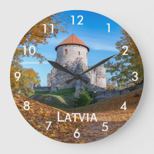 Medieval castle surrounded by forest large clock