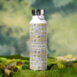 Mediterranean Lemon Tile Italian Coastal Design Water Bottle<br><div class="desc">Bring the warmth of the Mediterranean into your space with this charming Italian ceramic tile inspired pattern featuring bright lemons,  olives,  floral motifs,  and a radiant sun face. The design is inspired by traditional Mediterranean and Italy Coast ceramics,  blending classic blue ornamental details with sunny yellow citrus elements.</div>