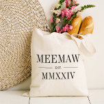 Meemaw Roman Numeral Year Established Tote Bag<br><div class="desc">A modern minimalist tote bag to celebrate a chic grandma,  this clean minimal tote features "Meemaw" or your choice of grandma nickname in black serif lettering. Customise with the year she became a grandmother beneath in elegant roman numerals for a chic touch.</div>