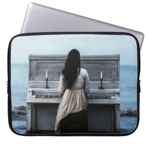 Melancholic Woman Playing Piano by the Sea Laptop Sleeve