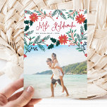 Mele Kalikimaka | Hawaiian Christmas Photo Holiday Card<br><div class="desc">Send holiday greetings to friends and family, island-style, with our tropical holiday photo cards. Design features your favourite photo with the Hawaiian Christmas greeting "Mele Kalikimaka" in red hand lettered typography, flanked by vibrant red poinsettia flowers and holly leaves that cascade over your photo. Personalise with your names and the...</div>