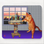 Menorah Cat Mouse Pad<br><div class="desc">So the cat is a redhead he’s an Ashkenazi!  And it's sundown so he's put on his kippah,  he's lighting the candles and saying the prayers,  and remembering that A Great Miracle Happened There.</div>