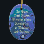 menorah lights blue ornament<br><div class="desc">Blue swirls of night colour flow in the background. A text message: "For eight dark nights,  menorah lights remind us of miracles and freedom." on one side. On the other a silver and blue menorah.</div>