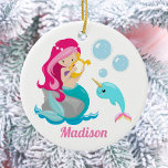 Mermaid Girl Cute Beach Narwhal Monogram Kids Ceramic Tree Decoration<br><div class="desc">Customize this beautiful pink haired mermaid girls Christmas ornament by adding your kid's name. Cute mermaid design with pretty underwater ocean narwhal and under the sea bubbles. Cute gift for a beach or pool outing in the summer.</div>