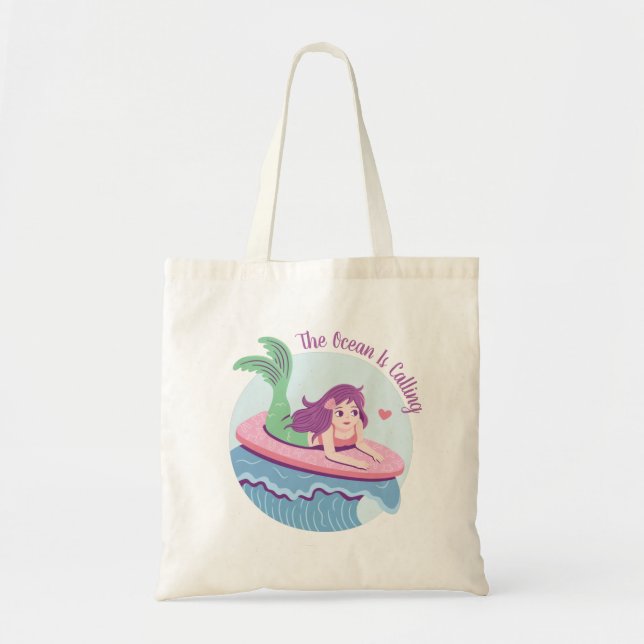 Mermaid On Pink Surfboard The Ocean Is Calling Tote Bag (Front)