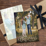 Merriest Christmas Elegant 2 Photos Christmas Holiday Card<br><div class="desc">This simple vertical photo Christmas card features a blend of elegant serif and script text. The design offers a full photo on the front with graceful text superimposed over the image. On the reverse side, a second photo serves as a muted backdrop, accompanied by personalised text for your heartfelt message....</div>