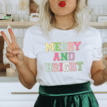 Merry And Bright Chenille Patch Letter Christmas T-Shirt<br><div class="desc">Share the holiday cheer with this festive Christmas Merry and Bright t-shirt design. Perfect to give as a Christmas gift or to treat yourself to some holiday happiness! This design features colourful trendy varsity patch letters that say Merry and Bright.</div>