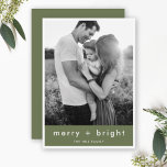 Merry and Bright Trendy Moss Green Christmas Photo Holiday Card<br><div class="desc">Simple, stylish, trendy "merry bright" flat photo holiday card with modern minimalist typography in white on a rich moss green background framed by a simple white border. The greeting, name, year can be easily customized for a personal touch. A quirky, unique christmas card to stand out from the crowd! The...</div>