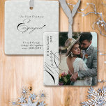 Merry and Engaged Script Vertical Photo Snowflake Ceramic Ornament<br><div class="desc">Merry & Engaged photo ornament with vertical photo, elegant calligraphy and delicate white snowflakes on a silver grey border. The photo template is ready for you to add your photo, the year and your custom text on the back. With the exception of the handwritten text used for Merry and Engaged,...</div>