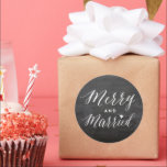 Merry And Married Black Chalkboard Holiday Wedding Classic Round Sticker<br><div class="desc">Designed by fat*fa*tin. Easy to customise with your own text, photo or image. For custom requests, please contact fat*fa*tin directly. Custom charges apply.
www.zazzle.com/fat_fa_tin
www.zazzle.com/color_therapy
www.zazzle.com/fatfatin_blue_knot
www.zazzle.com/fatfatin_red_knot
www.zazzle.com/fatfatin_mini_me
www.zazzle.com/fatfatin_box
www.zazzle.com/fatfatin_design
www.zazzle.com/fatfatin_ink</div>