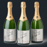 Merry Christmas Birch Trees and Red Cardinal Birds Sparkling Wine Label<br><div class="desc">This modern Christmas Sparkling Wine Label features hand-drawn birch trees with red Cardinal birds perched on branches in black ink,  against an elegant ivory background. Personalise with your favourite Holiday greeting and your family name.</div>