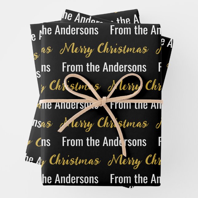 Merry Christmas Black White and Gold Script Name Wrapping Paper Sheet (In situ)