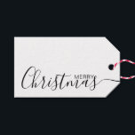 Merry Christmas Black White Minimalist Gift Tags<br><div class="desc">This minimalist and elegant gift tag features black Merry Christmas text on the front side and on the back side personalise it with your name or family name. The background is in white colour.</div>