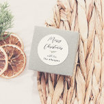 Merry Christmas Calligraphy & Family Name Pine Classic Round Sticker<br><div class="desc">A personalised Christmas sticker featuring elegant typography and a watercolor pine sprig. At the top of the sticker, 'Merry Christmas' is written in elegant script lettering, followed by the pine branch. Underneath, your family name is signed 'with love'. Ideal for sealing envelopes, decorating gift boxes, or embellishing festive items! Made...</div>