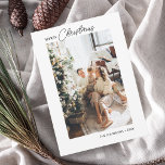 Merry Christmas Calligraphy Photo Holiday Card<br><div class="desc">**Personalized Minimalist Christmas Greeting Card** Celebrate the festive season with a touch of personal elegance. Introducing our minimalist Christmas greeting card, designed exclusively for those who appreciate simplicity with a hint of nostalgia. On the front, showcase your cherished photo, creating a sentimental focal point. Above your image, the phrase "Merry...</div>