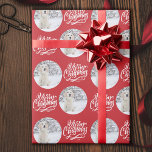 Merry Christmas Calligraphy Round Photo Red Wrapping Paper<br><div class="desc">Photo wrapping paper, personalised with your picture and hand lettered with Merry Christmas in brushed calligraphy. The photo template is set up to display your picture in a round shape. If you have any problems with picture placement, try cropping your photo to a square and re-uploading it. The background colour...</div>
