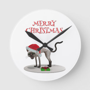Merry Christmas. Cat with Santa hat Round Clock
