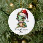 Merry Christmas Chameleon Santa Hat Holly Custom Ceramic Tree Decoration<br><div class="desc">Adorable chameleon wearing a Santa hat and holly berries wishes you a very Merry Christmas.  Personalise with greeting of your choice (Merry Christmas,  Happy Holidays,  Seasons Greetings) or your family’s last name and the year.</div>