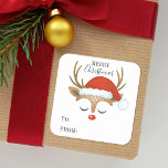 Merry Christmas Cute Personalised Reindeer Square Sticker<br><div class="desc">A cute reindeer face with a Santa hat decorates this square sticker with the words Merry Christmas and to: and from:. Fun for decorating Christmas gifts and holiday treat bags for neighbours. Personalise it with your name. Designed for you by Blackberry Boulevard.</div>
