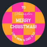Merry Christmas From Mum and Dad Bright Gift Tag<br><div class="desc">This is a bright Christmas design in a trending check pattern in orange and hot pink. It has the message, "To Alexander, Merry Christmas! Love Mum & Dad xxx". Ideal for your Christmas gift wrap, mailing accessories. envelope seals, and party favour seals this festive season. To personalise, simply add your...</div>