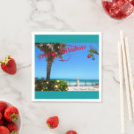 Merry Christmas from Vero Beach Florida Oceanfront Napkin<br><div class="desc">Merry Christmas from Vero Beach, Florida! These colourful tropical-themed paper napkins feature a photo image of a beautiful Vero Beach oceanfront area all decked out for the holidays. The festive design includes Christmas lights on the greenery, Christmas balls hanging from a palm frond, and the text "Merry Christmas" in red...</div>