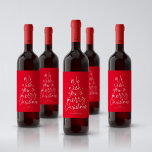 Merry Christmas fun red personalised holiday Wine Label<br><div class="desc">This personalised Christmas wine label features fun and playful type that reads "we wish you a Merry Christmas" in white on red along with room for a name. This sweet holiday design is perfect for gifts of wine or other beverages and treats. Available in other colours and styles too! Find...</div>