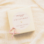 Merry Christmas & Gold Heart Cream Holiday Classic Round Sticker<br><div class="desc">Merry Christmas & Gold Heart Cream Holiday Round Stickers! These minimalist stickers feature a "merry christmas" greeting at the top of the card, with "merry" written in elegant script calligraphy, adorned with simple flourishes at either end. Below, there is a cute gold heart. With your family name and the year...</div>