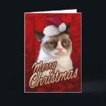 Merry Christmas Grumpy Cat Holiday Card<br><div class="desc">This card features Grumpy Cat in a santa hat,  with "Merry Christmas" on the front.</div>