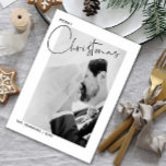 Merry Christmas Handlettered Photo First Christmas Holiday Card<br><div class="desc">This beautiful, modern Merry Christmas Handlettered Name Photo Christmas Holiday Card features your vertical wedding photo behind a white border. The photo has a black and white filter applied, to create a black and white look for the card. You may toggle the filter off, if you prefer. The word 'Merry'...</div>