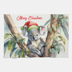 Merry Christmas Koala sitting in Gumtree Tea Towel
