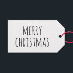 Merry Christmas | Minimalist Cute Holiday Present Gift Tags<br><div class="desc">Add a charming touch to your holiday gifts with this black and white Merry Christmas gift tag. Featuring a simple and cute handwritten font, this tag is perfect for attaching to presents, stocking stuffers, or party favours. Its minimalist design complements any wrapping style, from rustic to modern, making your gifts...</div>